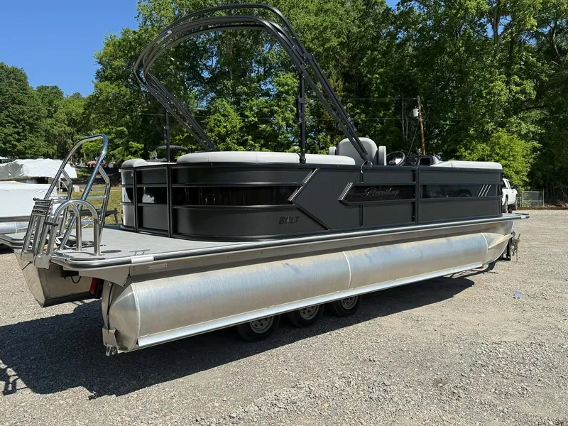 Slide: The Image of 2026 Bentley Pontoons 223 Bolt on a gravel lot. - 24