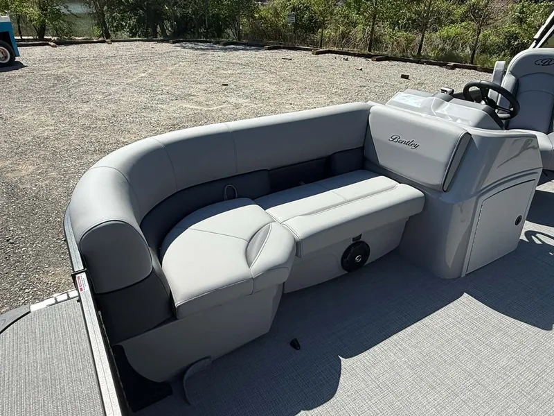 Slide: The Image of 2026 Bentley Pontoons 223 Bolt with gray seating area. - 25