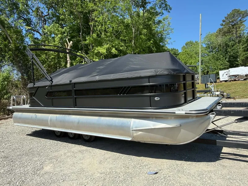 Slide: The Image of 2026 Bentley Pontoons 223 Bolt with cover parked outdoors. - 5