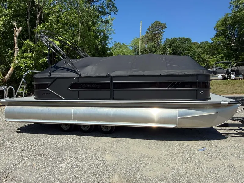 Slide: The Image of 2026 Bentley Pontoons 223 Bolt with black cover outdoors. - 6