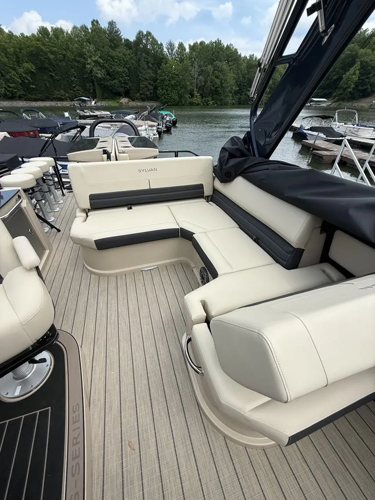 Slide: The Image of 2025 Sylvan G3 DLZ Bar boat with luxurious seating area. - 10