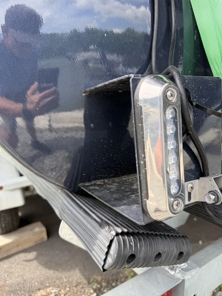 Slide: The Image of Close-up of a 2025 Sylvan G3 DLZ Bar boat. - 13