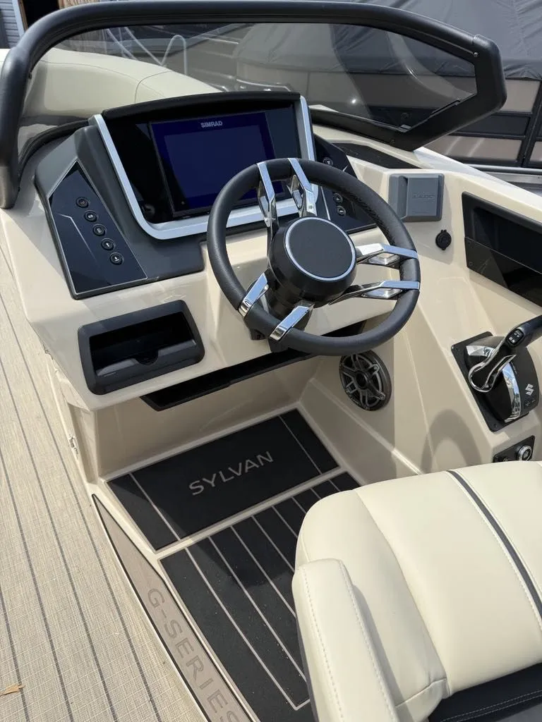 Slide: The Image of Interior view of Sylvan G3 DLZ Bar 2025 boat cockpit. - 19