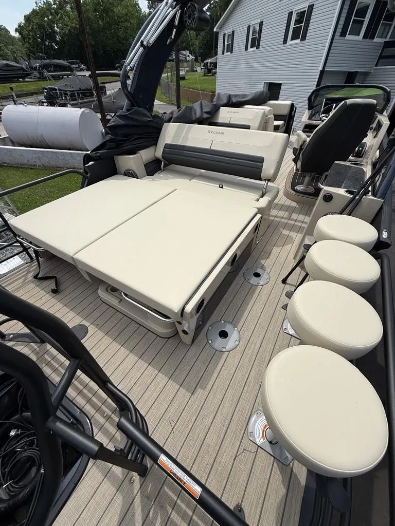 Slide: The Image of 2025 Sylvan G3 DLZ Bar with luxurious seating and bar stools. - 4