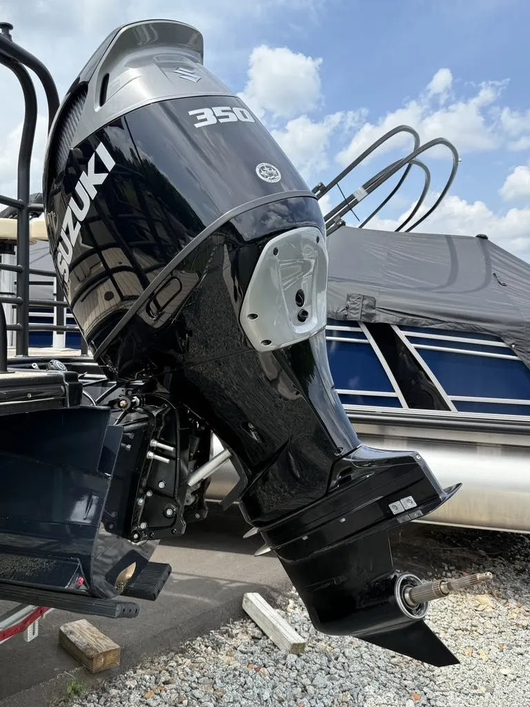 Slide: The Image of Suzuki 350 outboard motor on a 2025 Sylvan G3 DLZ Bar boat. - 9