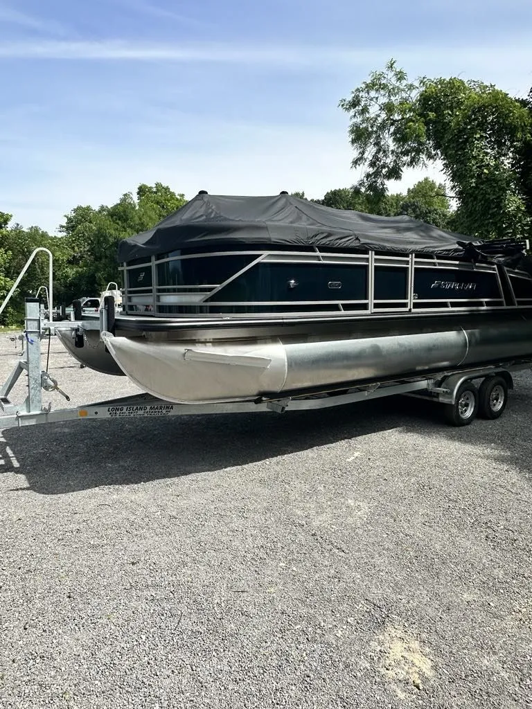 Slide: The Image of 2024 Starcraft CX 23 Q DH pontoon boat on trailer. - 13