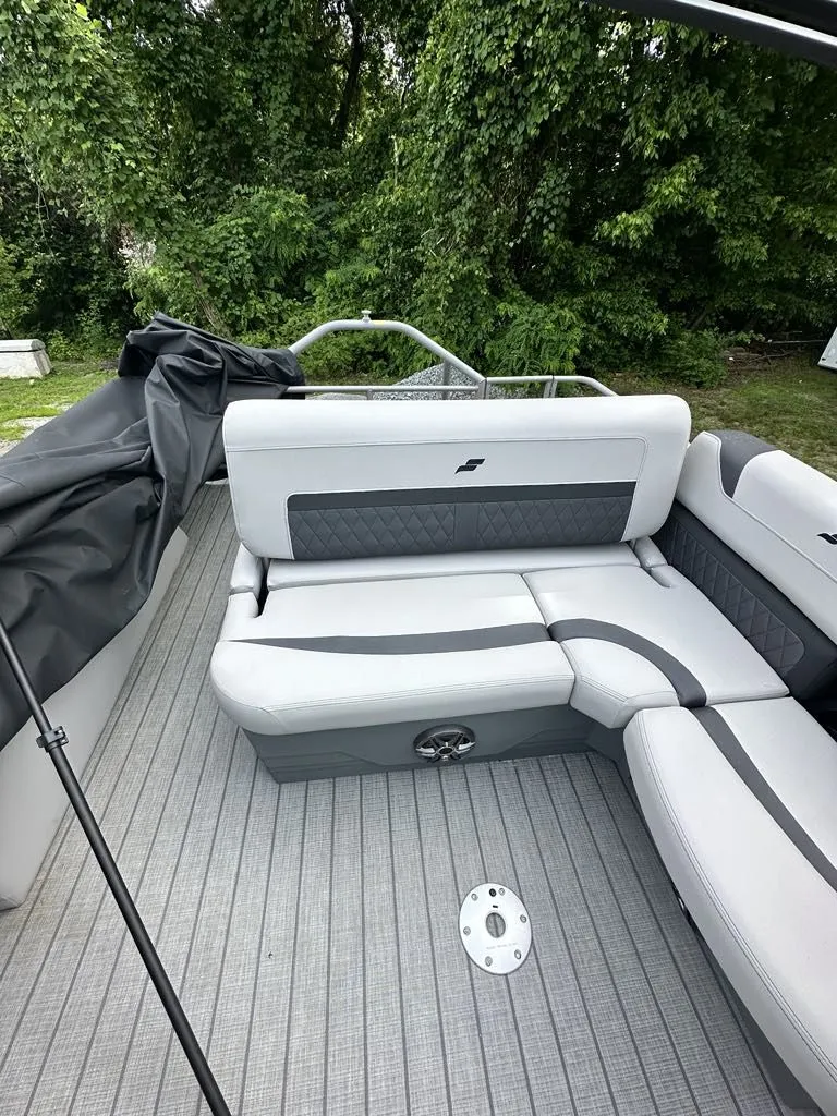 Slide: The Image of Interior of 2024 Starcraft CX 23 Q DH with gray upholstery. - 7