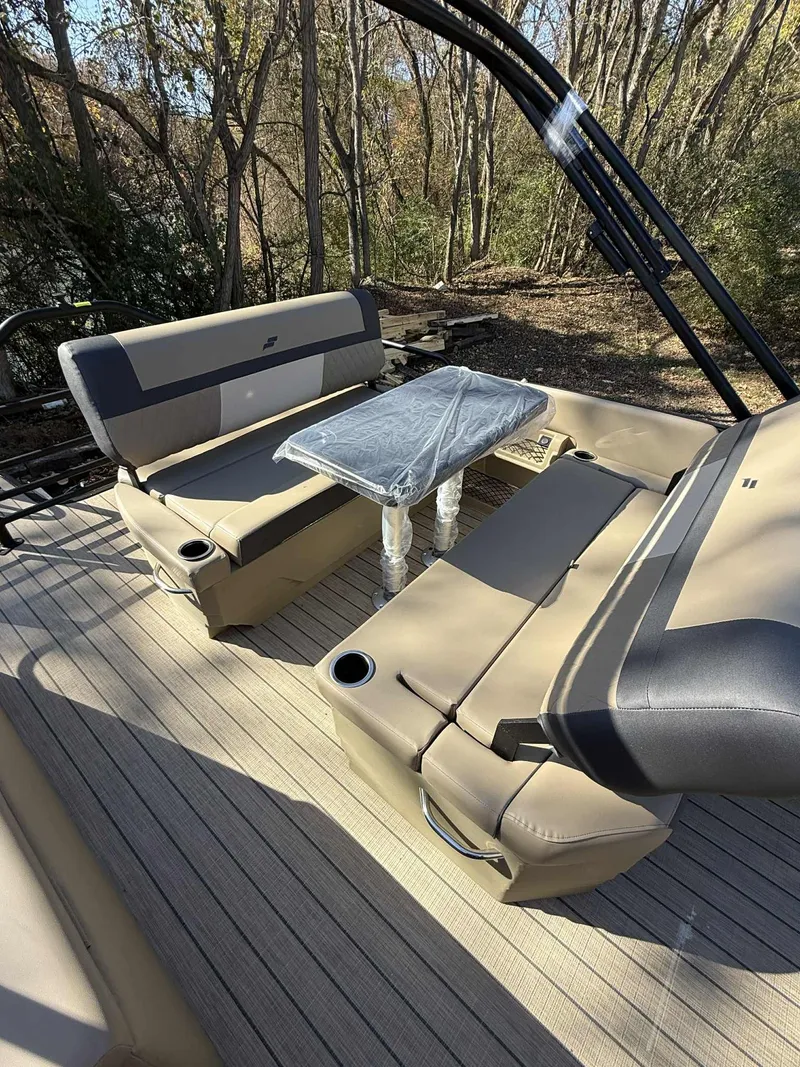 Slide: The Image of Interior of 2026 Starcraft EXS-3 DL with seating and table. - 13