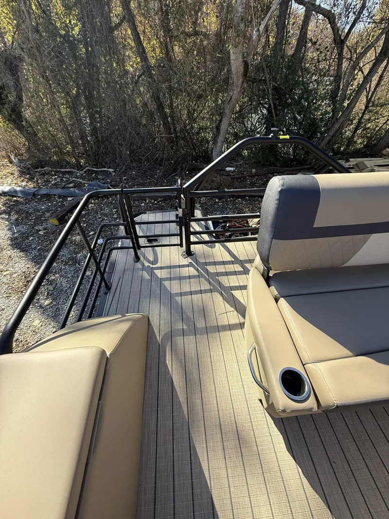 Slide: The Image of Starcraft EXS-3 DL 2026 pontoon boat with seating area and railing. - 19