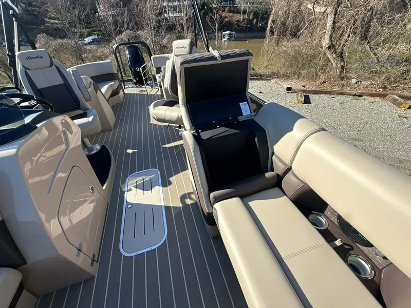 Slide: The Image of Interior of 2026 Bentley Pontoons Elite 223 Admiral with luxurious seating. - 11