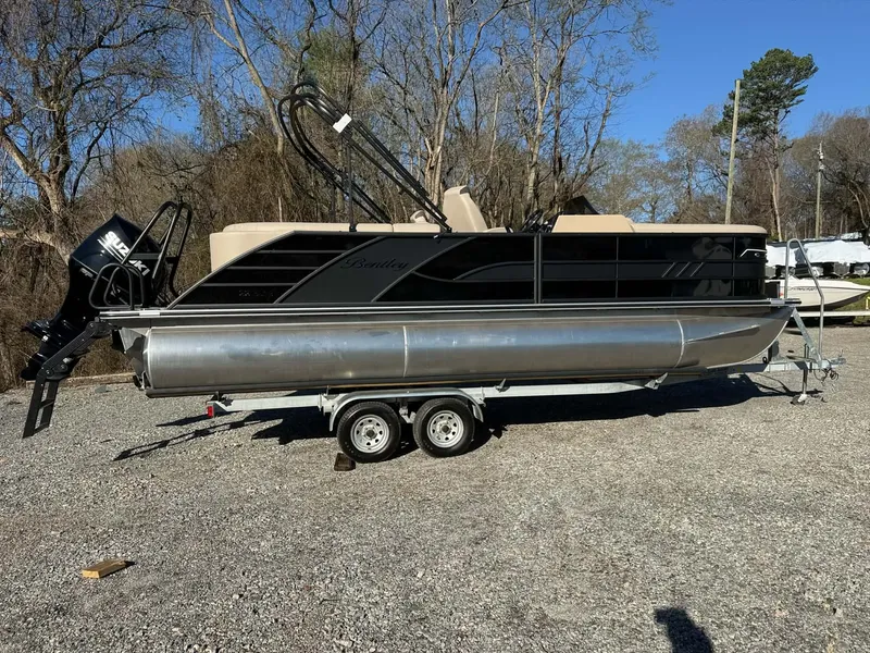 Slide: The Image of 2026 Bentley Pontoons Elite 223 Admiral on trailer outdoors. - 12