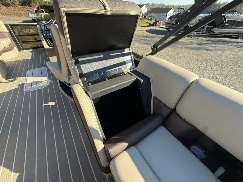 Slide: The Image of 2026 Bentley Pontoons Elite 223 Admiral seat with storage compartment. - 14