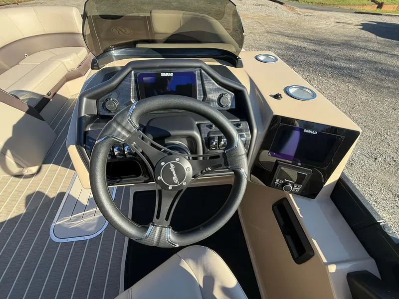 Slide: The Image of Interior view of 2026 Bentley Pontoons Elite 223 Admiral helm. - 19