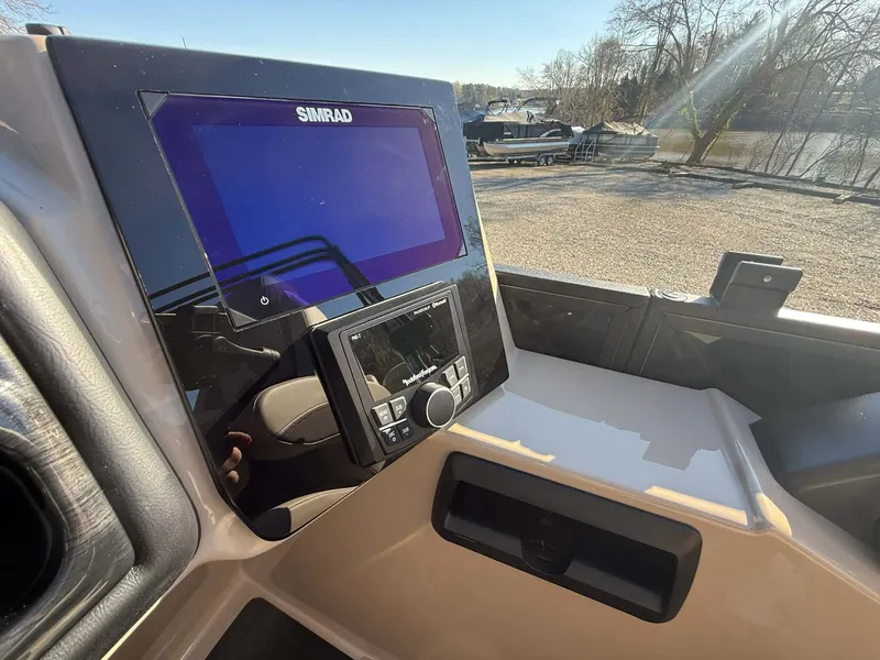 Slide: The Image of 2026 Bentley Pontoons Elite 223 Admiral console with Simrad display. - 23