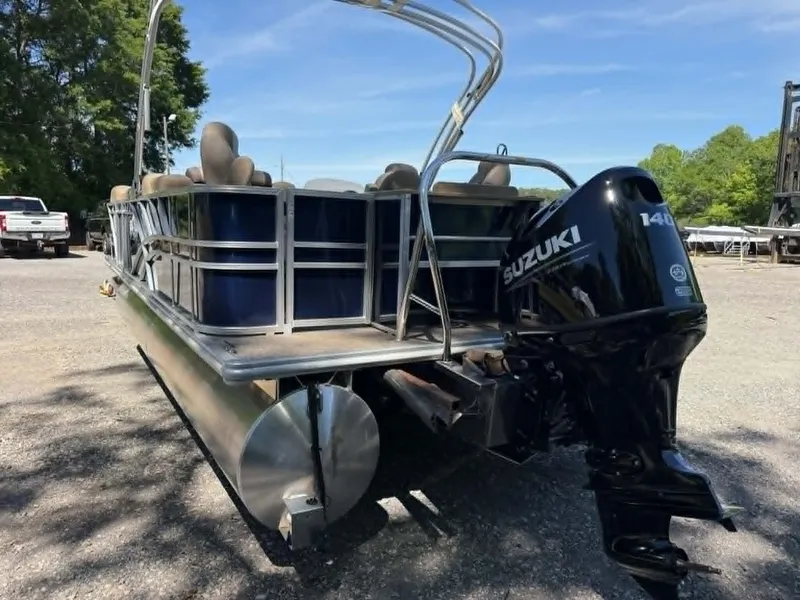 Slide: The Image of 2025 Sylvan Mirage 8522 Party Fish with Suzuki motor outdoors. - 10