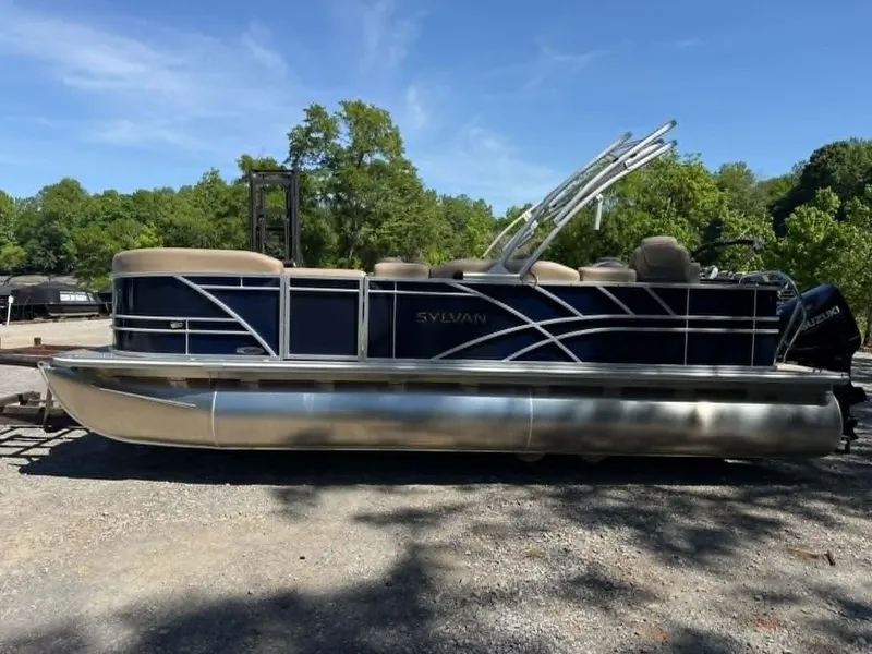 Slide: The Image of 2025 Sylvan Mirage 8522 Party Fish pontoon boat outdoors. - 12