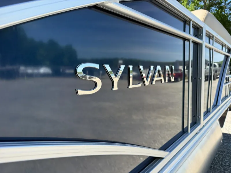 Slide: The Image of Sylvan Mirage 8522 Party Fish 2025 boat, close-up of logo. - 20