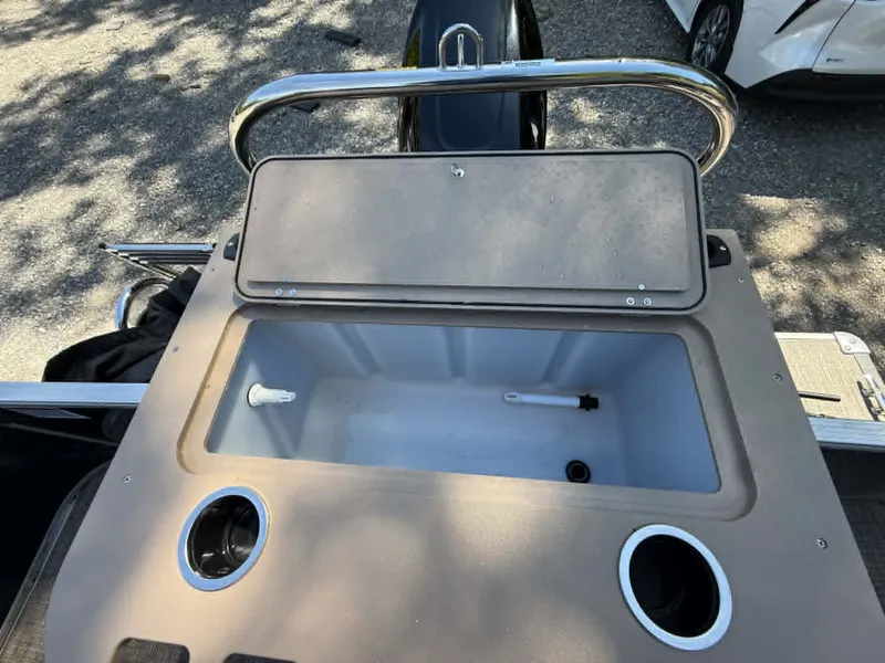 Slide: The Image of Sylvan Mirage 8522 Party Fish 2025 with open storage compartment. - 21