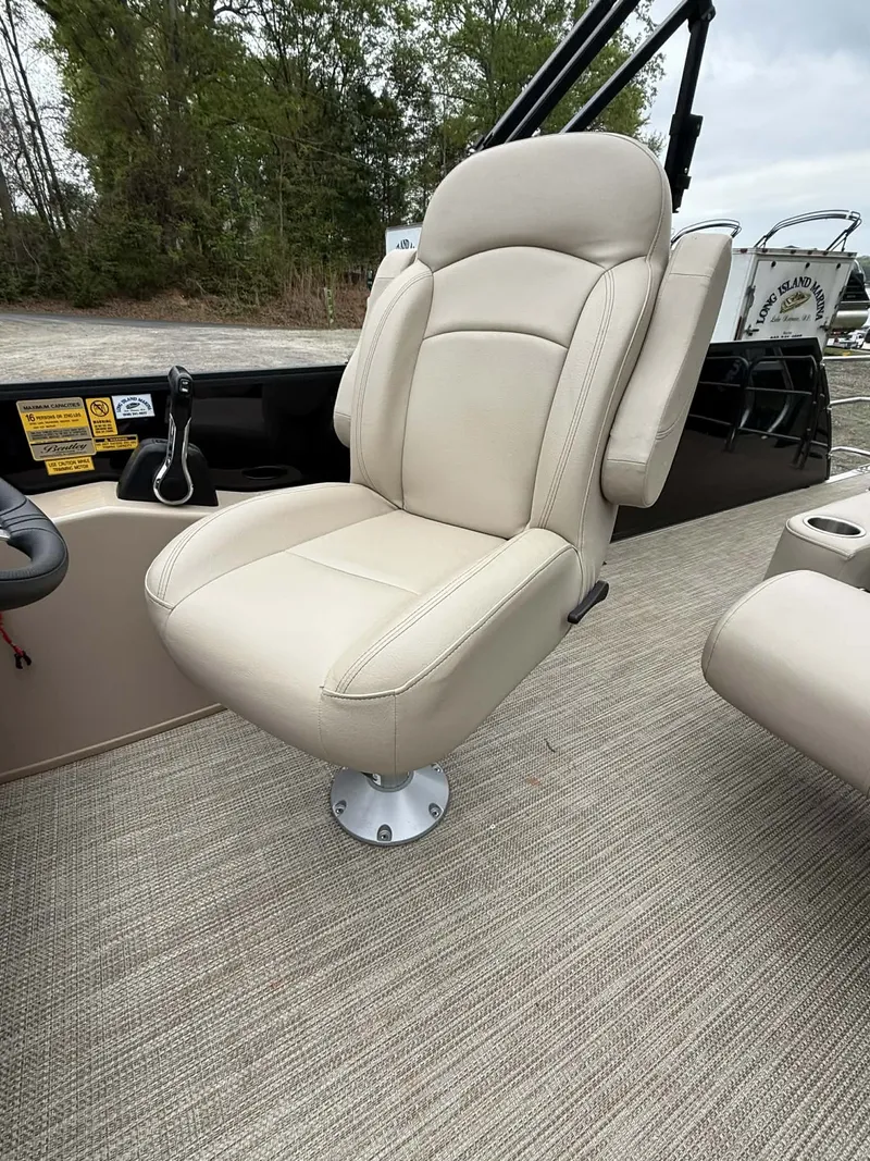 Slide: The Image of 2023 Bentley Pontoons Legacy 243 Swingback seat on boat. - 13
