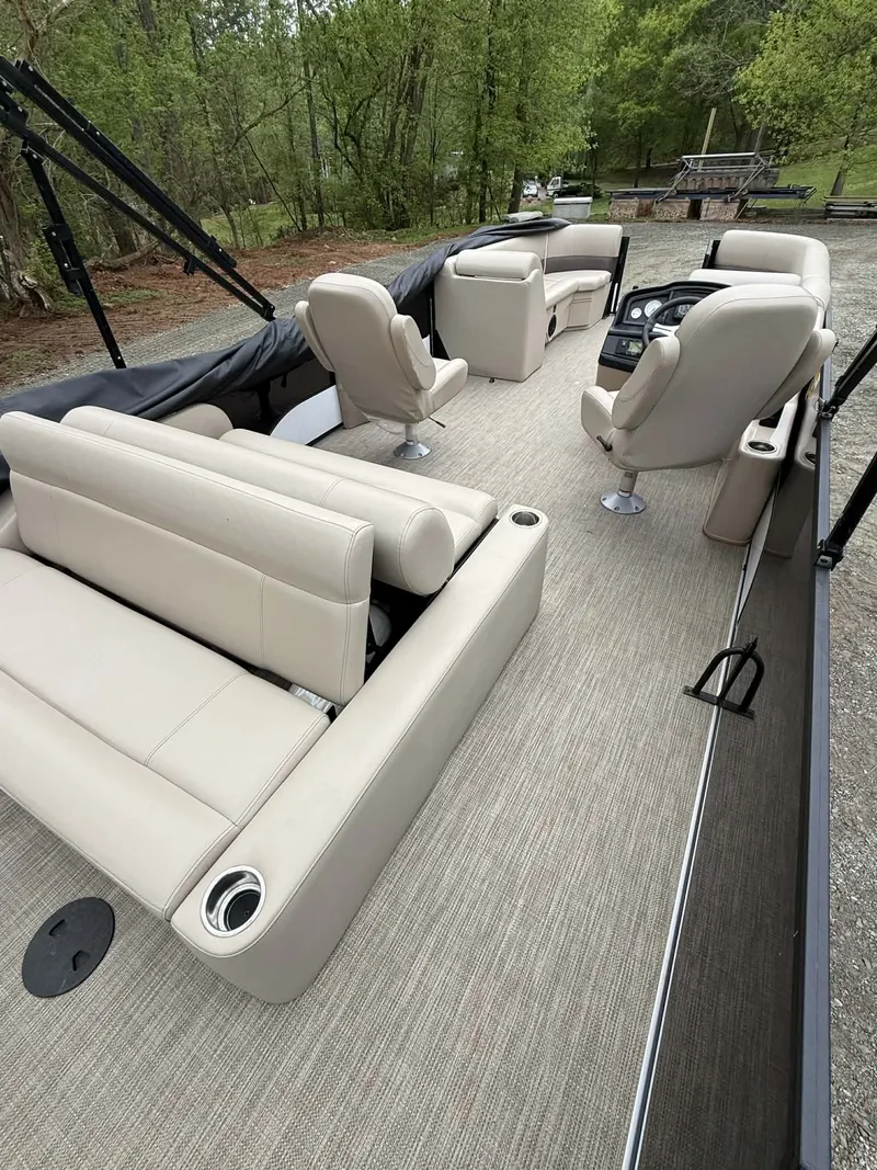 Slide: The Image of 2023 Bentley Pontoons Legacy 243 Swingback with luxurious interior seating. - 14
