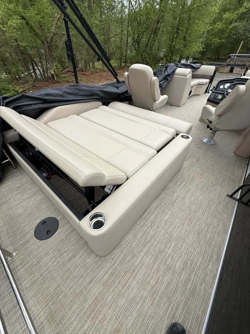 Slide: The Image of Interior of 2023 Bentley Pontoons Legacy 243 Swingback with beige seating. - 3