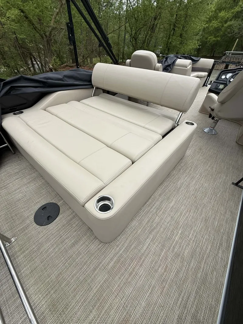 Slide: The Image of 2023 Bentley Pontoons Legacy 243 Swingback interior with beige upholstery. - 8
