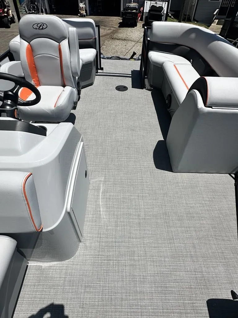 Slide: The Image of Interior of a 2025 Bentley Pontoons Bentley Bolt with gray seating. - 3