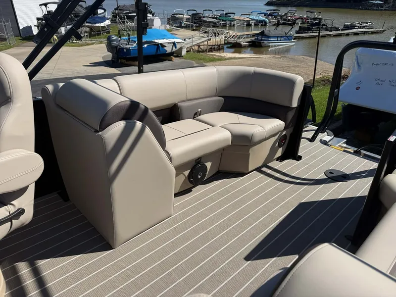 Slide: The Image of Interior of 2026 Bentley Pontoons Legacy 223 Navigator with beige seating. - 17