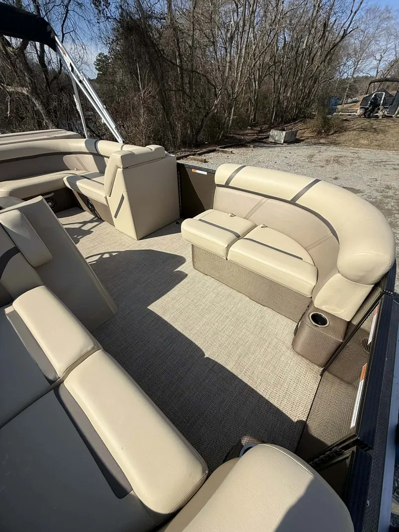 Slide: The Image of Interior of a 2024 Crest Classic LX 200 pontoon boat. - 10