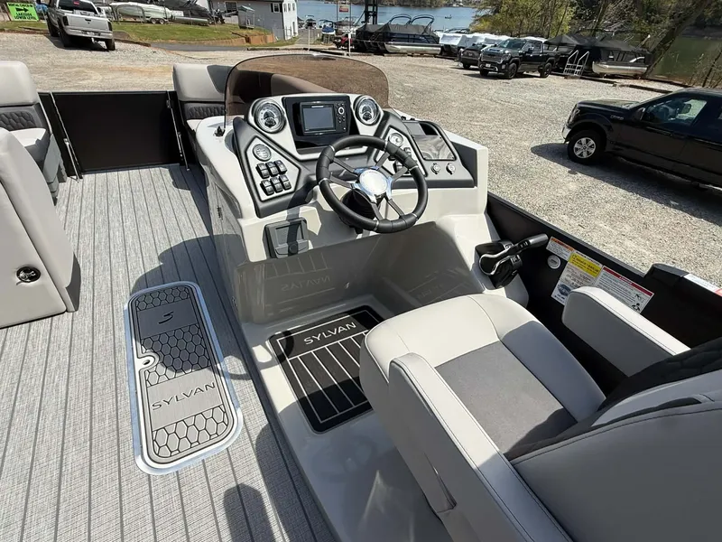 Slide: The Image of Interior of 2026 Sylvan L-3 RLZ with modern helm station. - 10