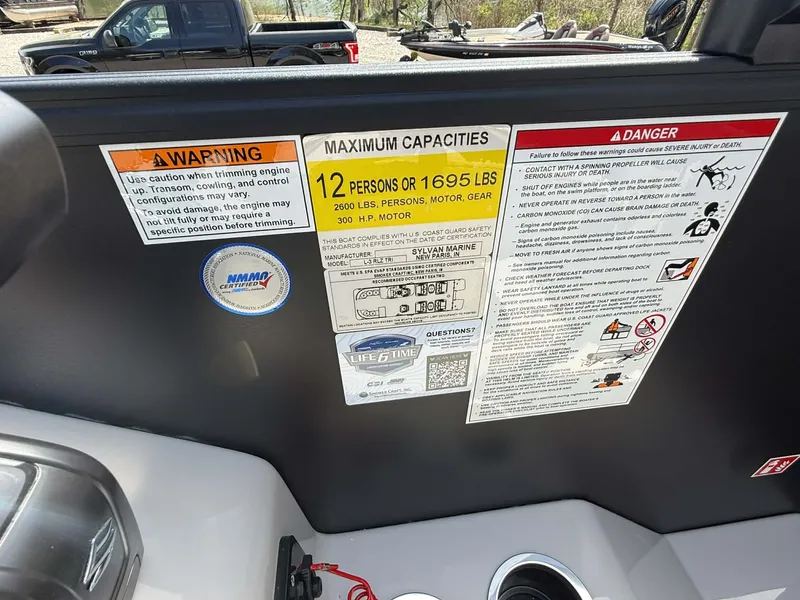 Slide: The Image of Safety and capacity labels on a 2026 Sylvan L-3 RLZ boat. - 22