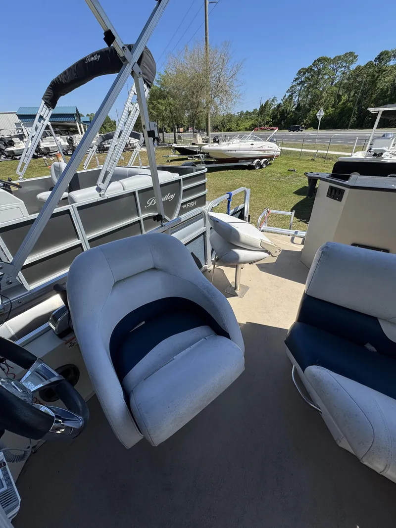 Slide: The Image of 2013 Lowe X214 Fish boat with comfortable outdoor seating. - 14