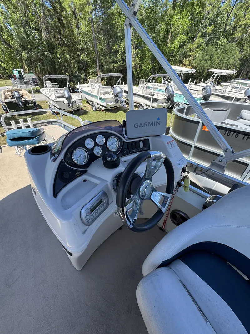 Slide: The Image of 2013 Lowe X214 Fish boat console with Garmin device. - 29