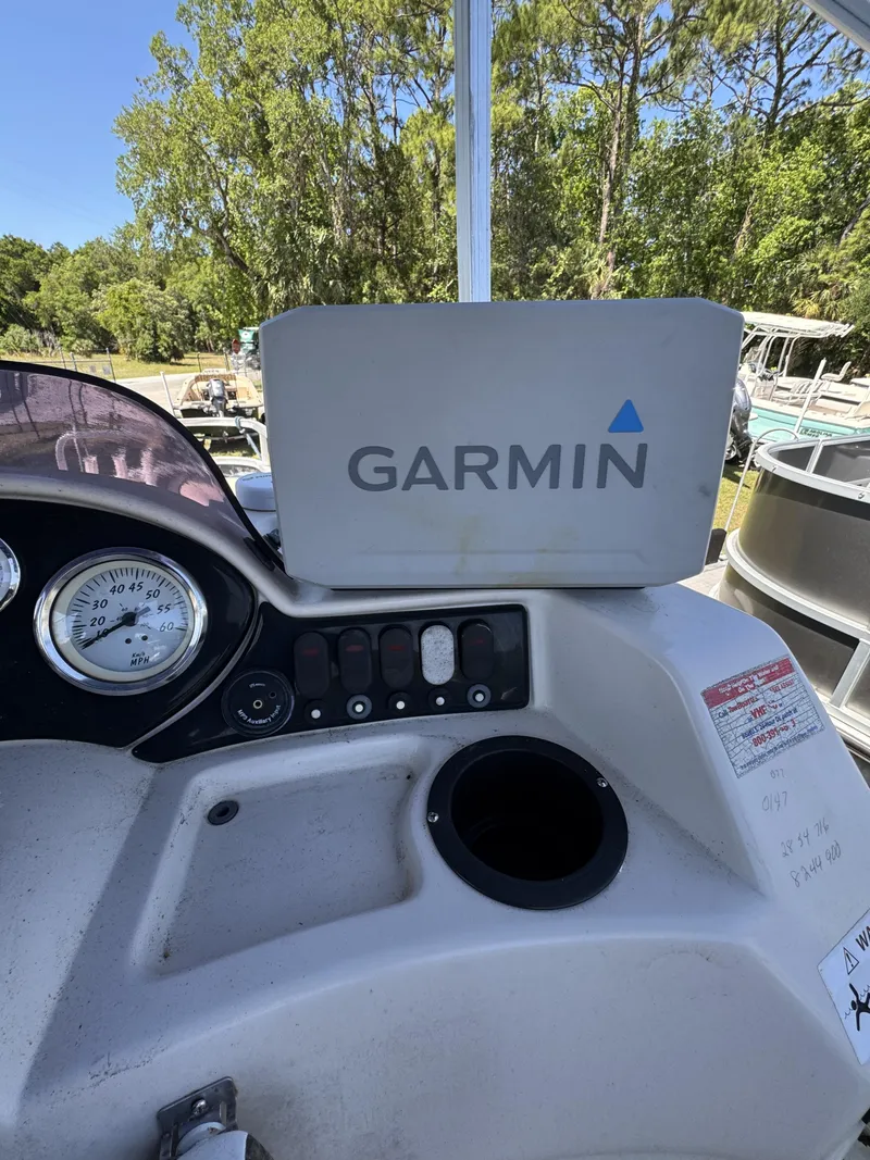 Slide: The Image of Lowe X214 Fish 2013 boat console with Garmin device. - 30