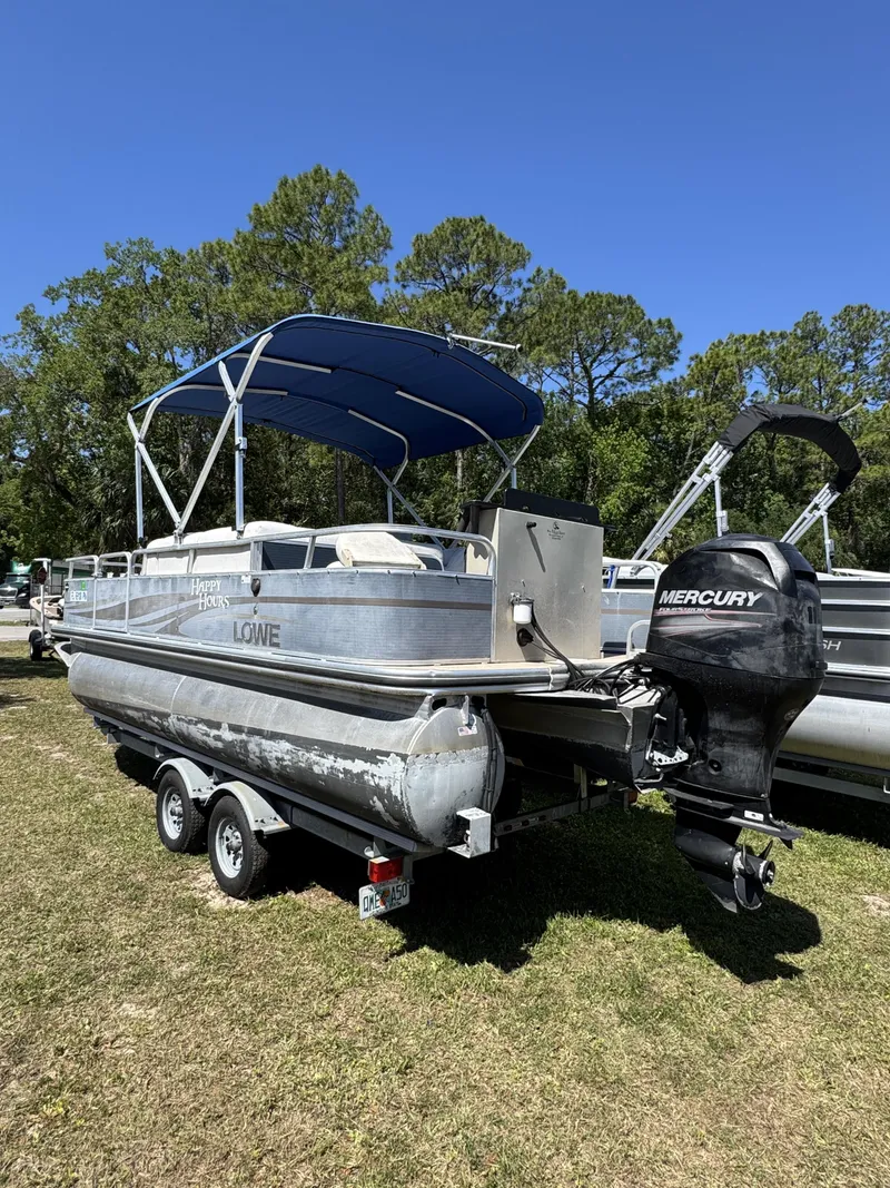 Slide: The Image of 2013 Lowe X214 Fish boat with Mercury engine on trailer. - 5