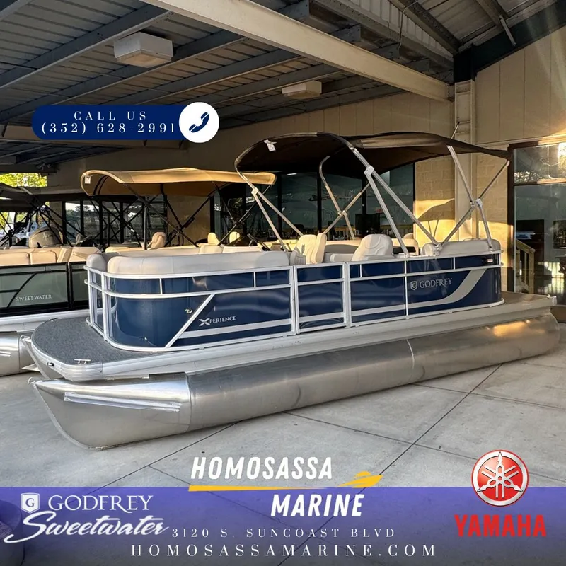 The Image of Sweetwater EX2086SBX pontoon boat at Homosassa Marine, Yamaha logo visible. - 1