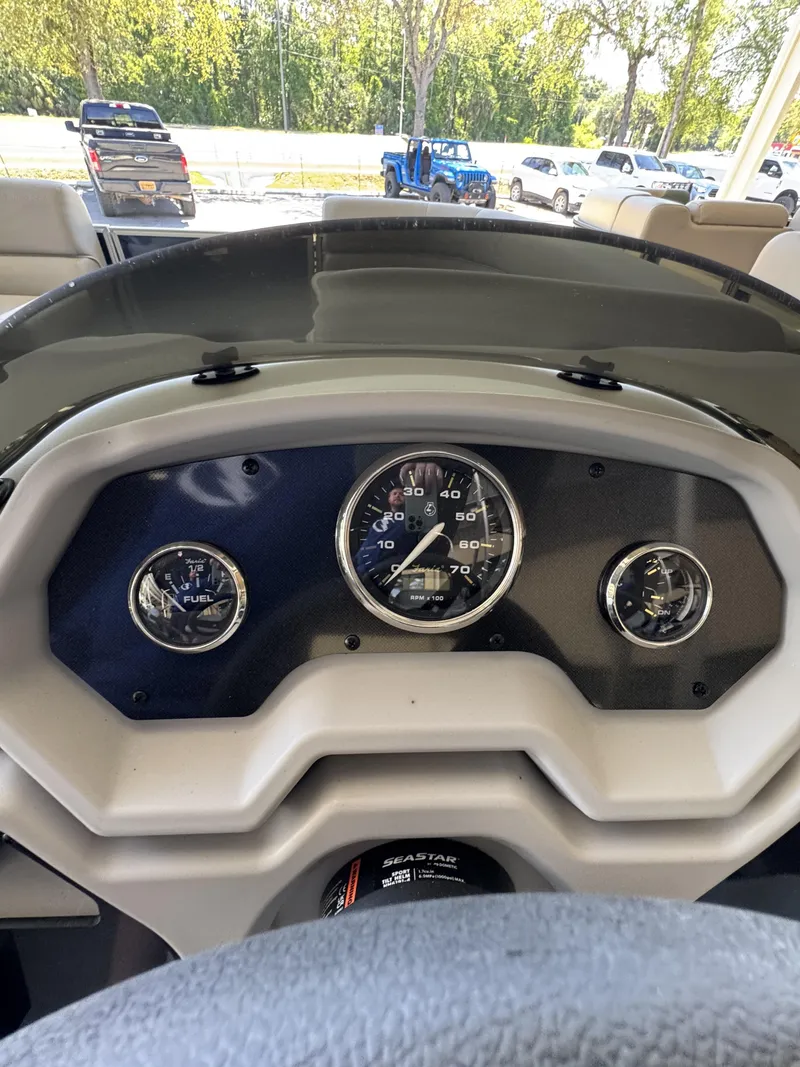 Slide: The Image of Dashboard of a Sweetwater EX2086SBX boat, model year 2026. - 11