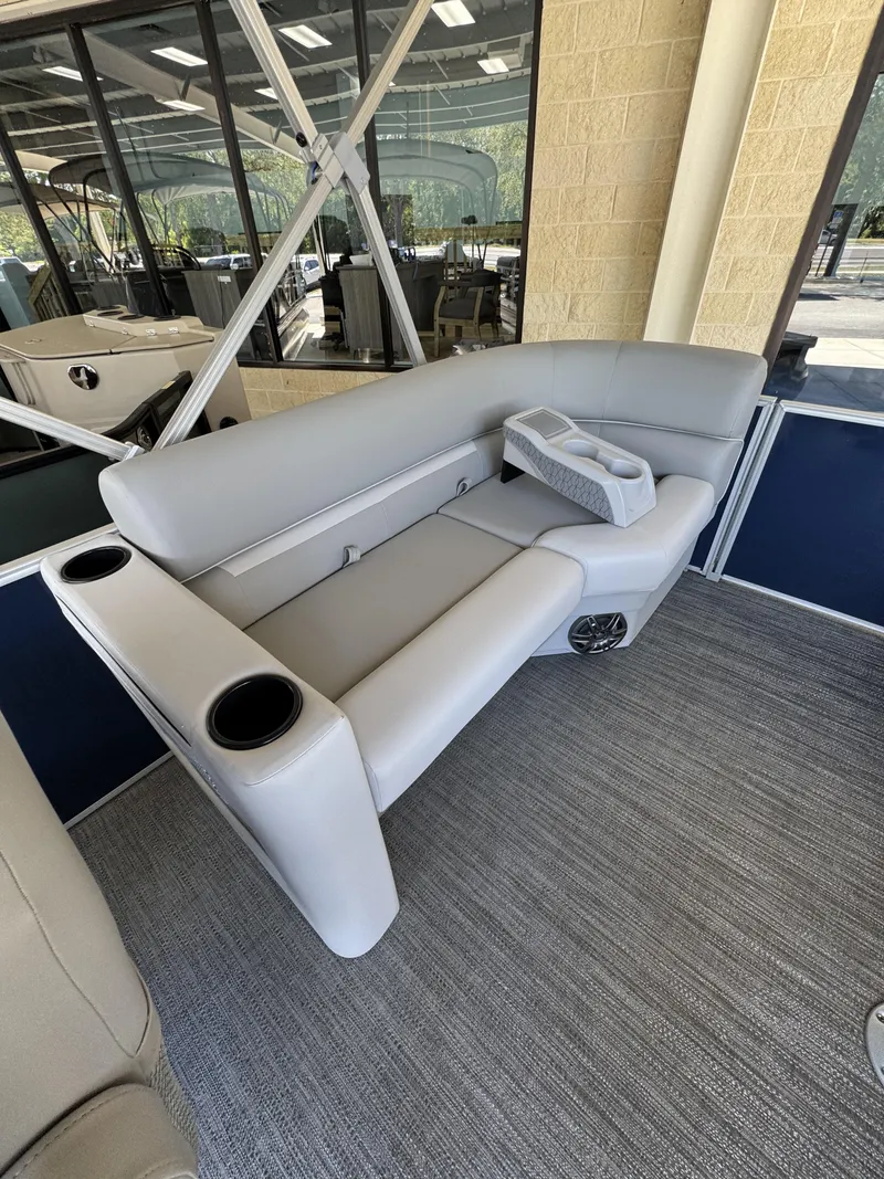 Slide: The Image of Interior of Sweetwater EX2086SBX 2026 with gray leather seating. - 13
