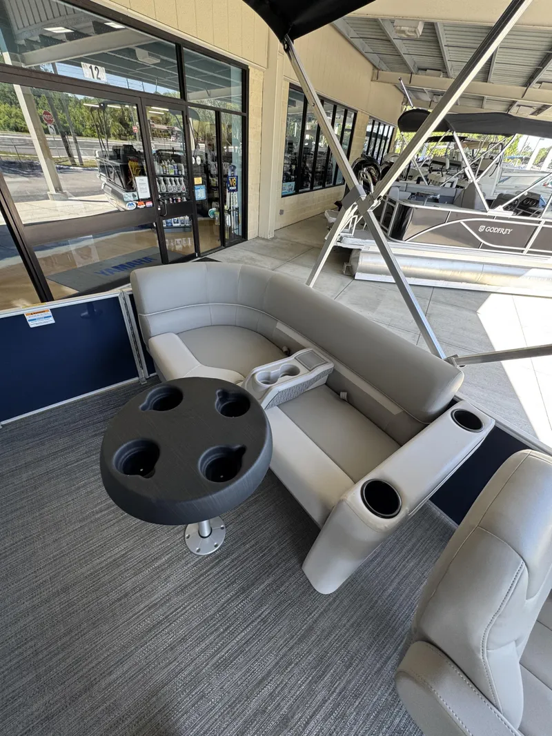 Slide: The Image of Interior of a Sweetwater EX2086SBX pontoon boat, model year 2026. - 14