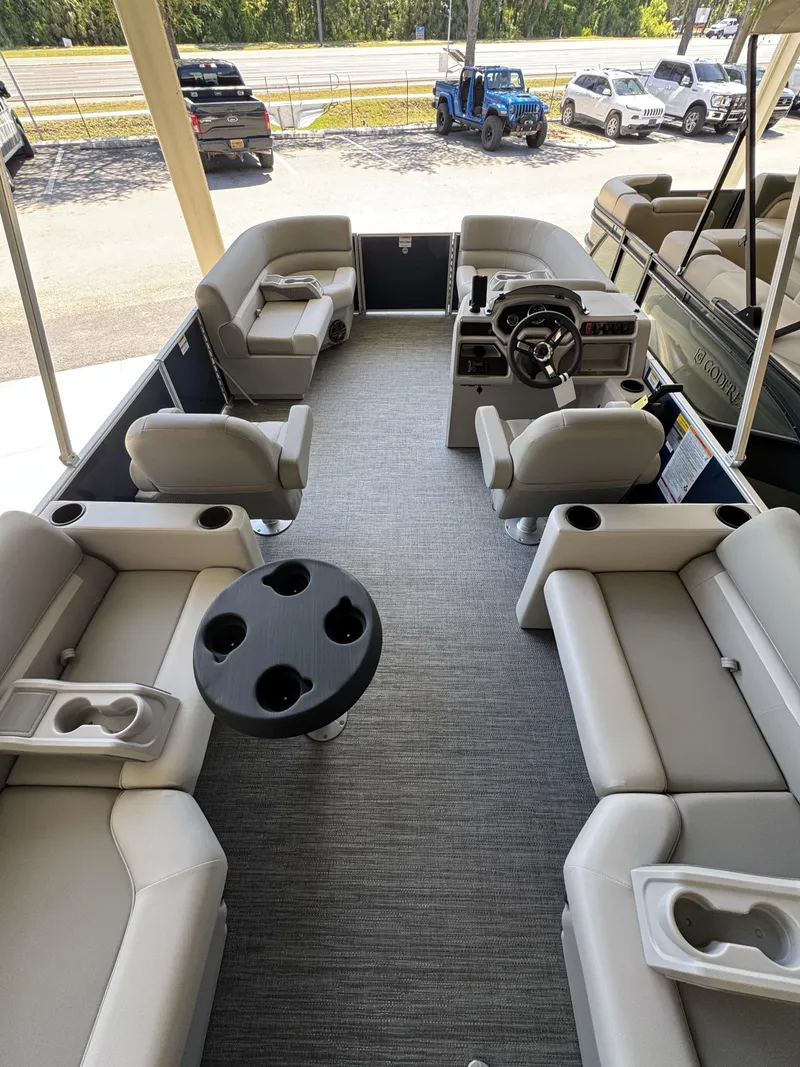 Slide: The Image of Interior of Sweetwater EX2086SBX pontoon boat, 2026 model, featuring gray seating. - 15