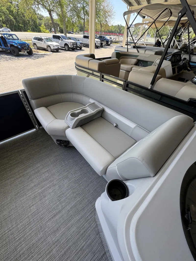 Slide: The Image of Interior of a Sweetwater EX2086SBX pontoon boat, model year 2026. - 21