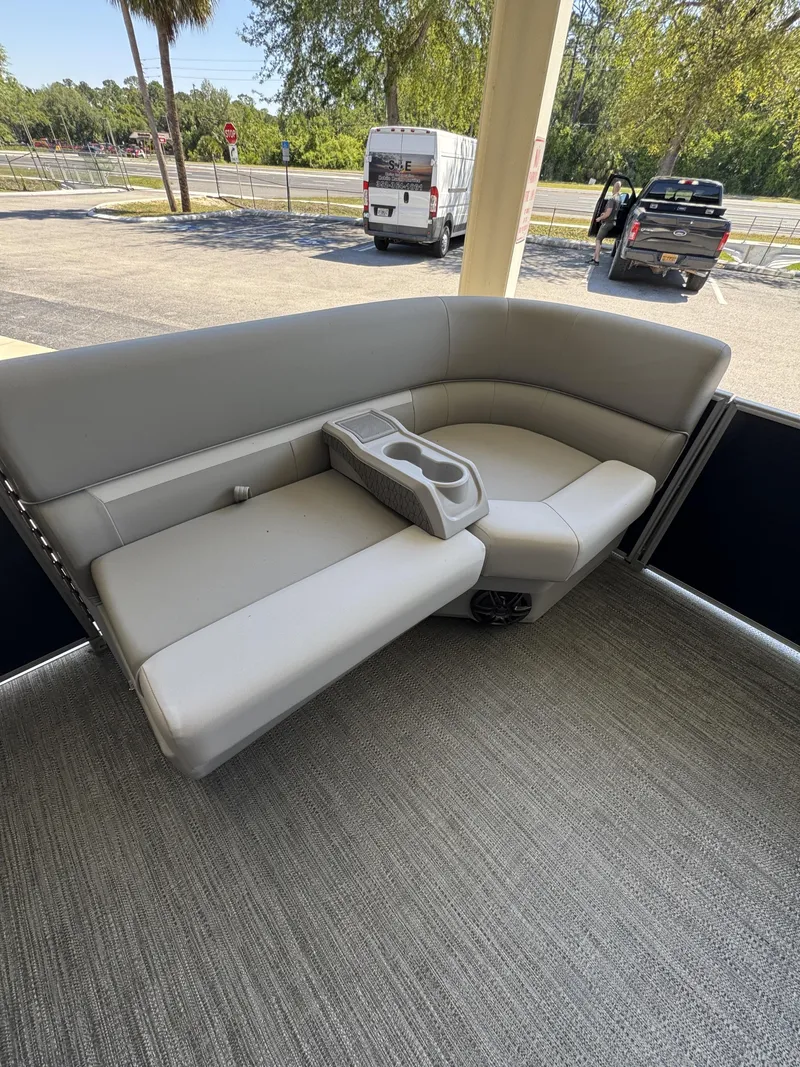 Slide: The Image of Sweetwater EX2086SBX 2026 boat seat with gray upholstery and cup holder. - 22