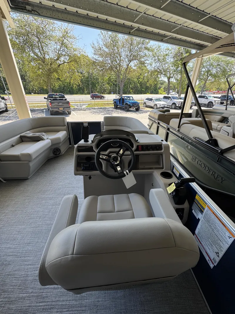 Slide: The Image of Interior view of a 2026 Sweetwater EX2086SBX pontoon boat. - 28