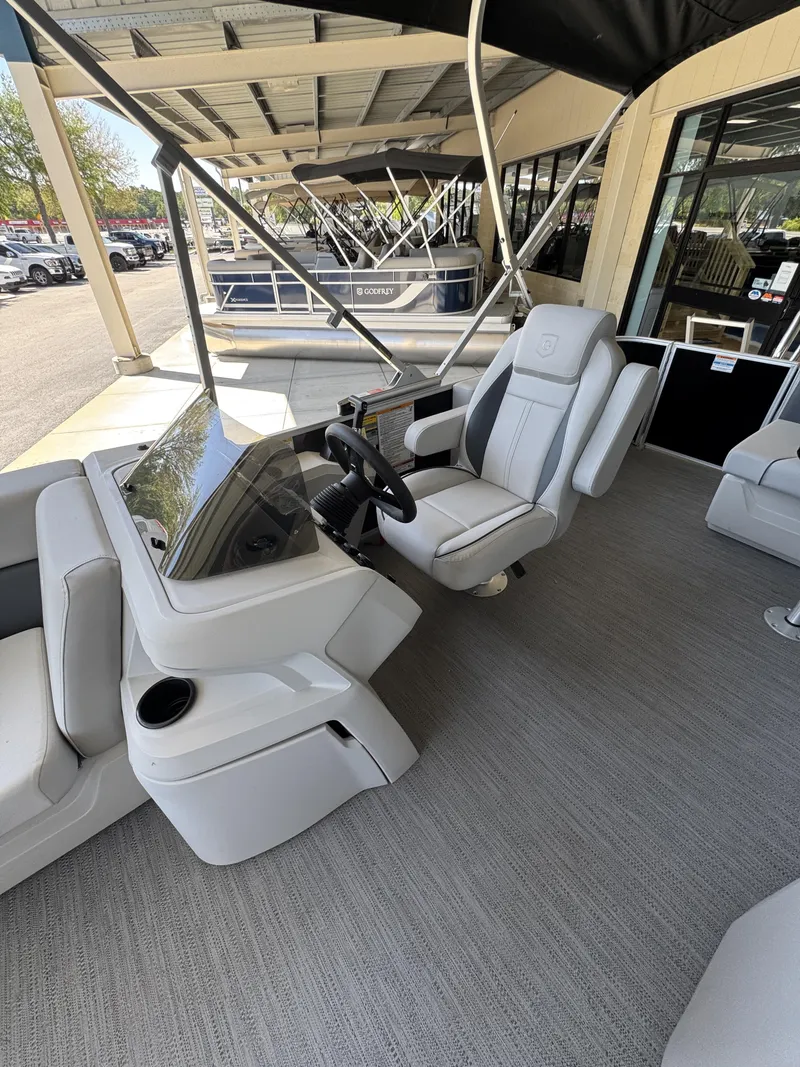 Slide: The Image of Interior of a Sweetwater SW2086CSE pontoon boat, model year 2026. - 10