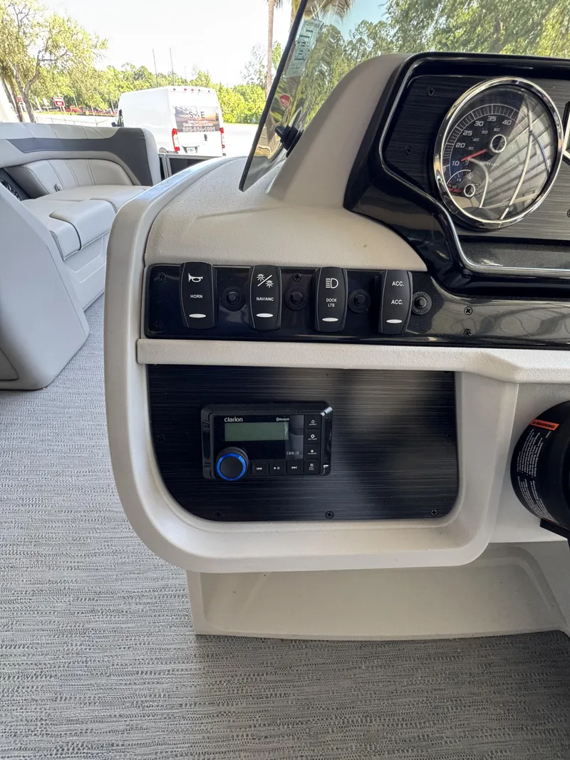 Slide: The Image of Dashboard of a Sweetwater SW2086CSE boat, model year 2026. - 12