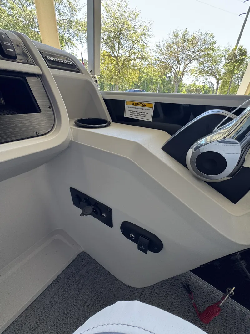Slide: The Image of Interior view of Sweetwater SW2086CSE boat, model year 2026. - 13