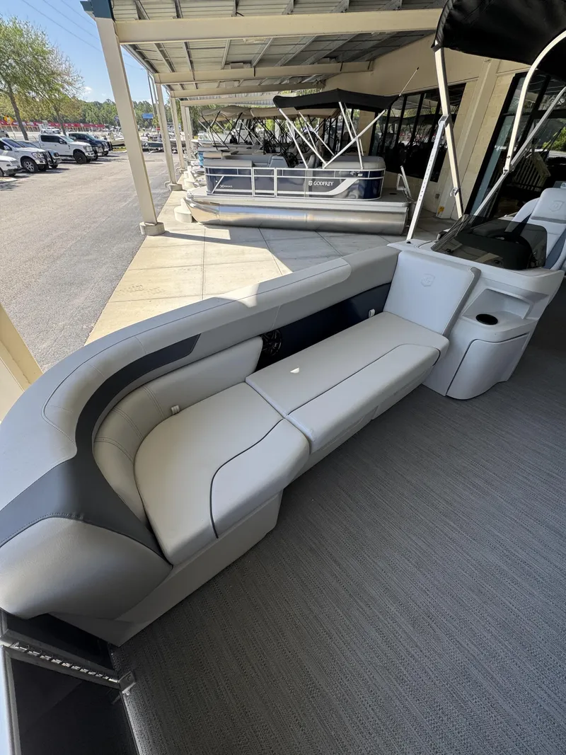 Slide: The Image of Interior of a Sweetwater SW2086CSE pontoon boat, model year 2026. - 19