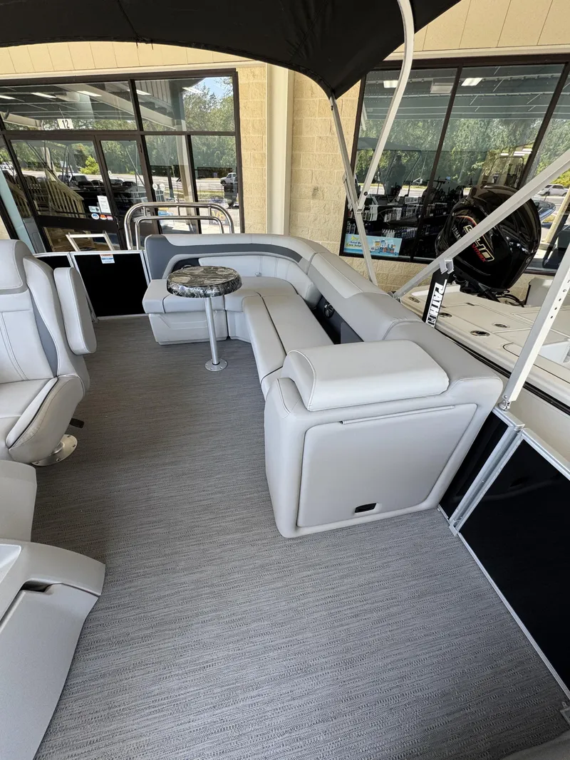 Slide: The Image of Interior of Sweetwater SW2086CSE pontoon boat, model year 2026. - 21