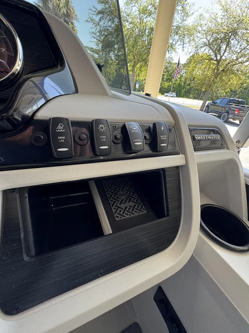 Slide: The Image of Dashboard of a Sweetwater SW2086CSE boat, model year 2026. - 24