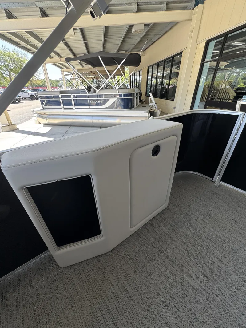 Slide: The Image of Interior of a Sweetwater SW2086CSE pontoon boat, model year 2026. - 29